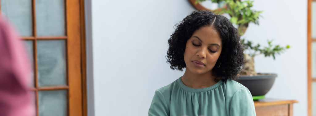 green shirt woman | San Diego Wellness Center